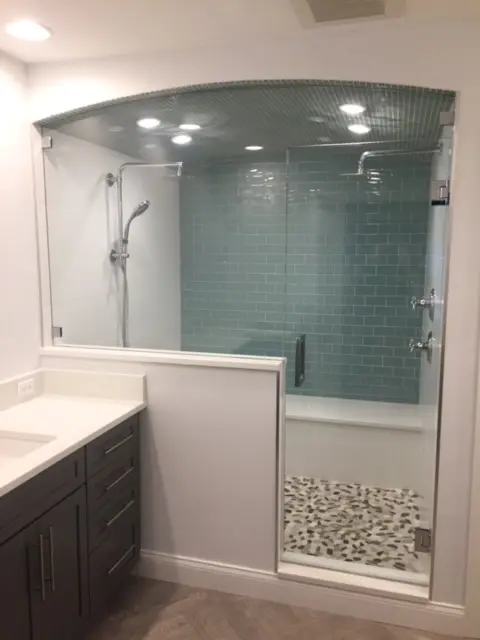 An example of frameless shower doors installed in Palm Beach, FL